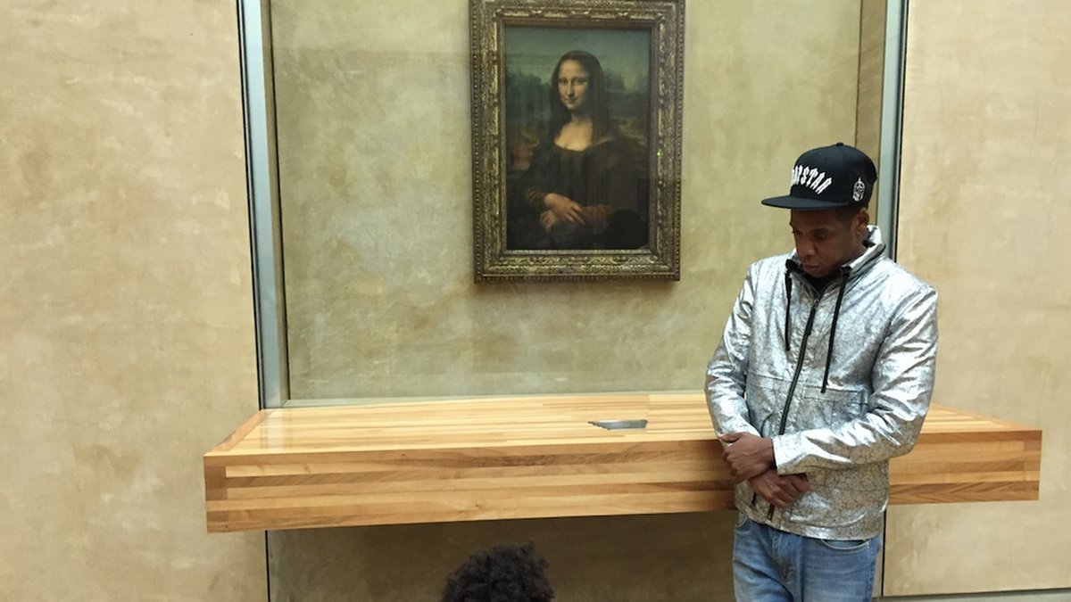Blue och pappa Jay-Z framför Mona Lisa.